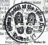 Passport stamp for the Hiker Hostel at the Yellow Deli.